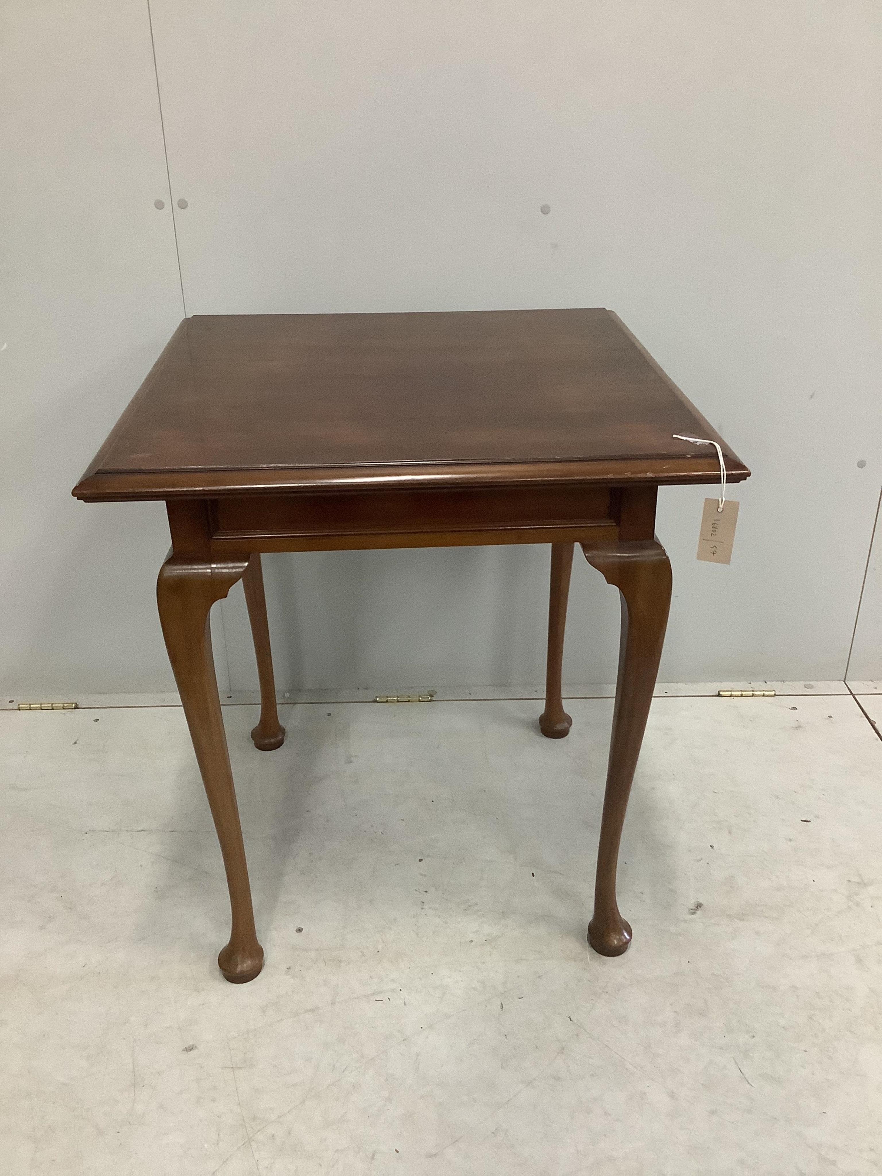 An early 20th century square mahogany occasional table, width 68cm, height 76cm. Condition - fair